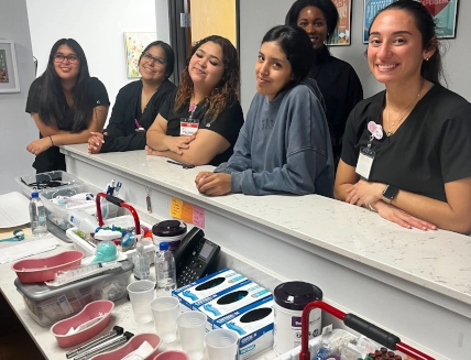 Medical assistant student studying for certification exam